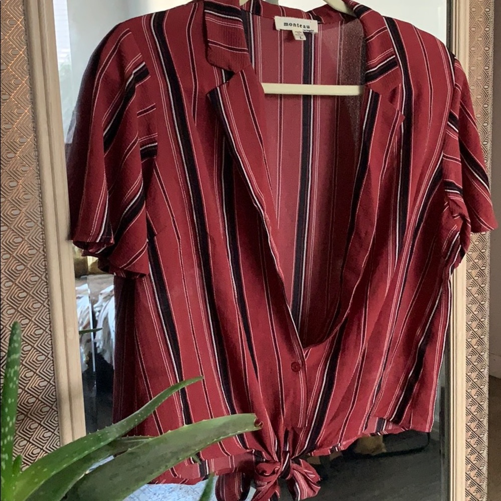 Striped button up with collar and tie at bottom